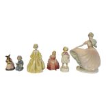 A COLLECTION OF VINTAGE PORCELAIN FIGURINES Comprising a large Coalport figure, Ladies of Leisure