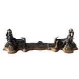 A 19TH CENTURY FRENCH BRONZE FIGURAL CHENET The serpentine rail cast with a central shell and