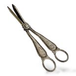 A PAIR OF VICTORIAN SILVER GRAPE SCISSORS Having fine engraved decoration, hallmarked Frederick