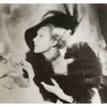 A SILVER GELATIN PRINT MARLENE DIETRICH Mounted, framed and glazed. (56cm x 49cm, 80cm x 72cm