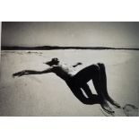 ROBERT MORT, A VINTAGE BLACK AND WHITE PHOTOGRAPH Nude female on a beach, inscribed to reverse '