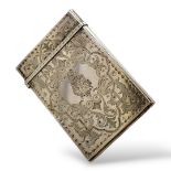 A VICTORIAN SILVER RECTANGULAR CALLING CARD CASE With hinged lifts and engraved decoration with