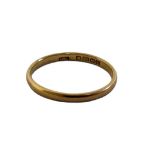 AN EARLY 22CT PLAIN GOLD WEDDING BAND. (size V) Condition: good