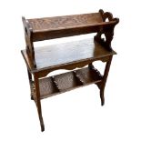 A LATE VICTORIAN OAK BOOK TROUGH Along with a walnut students bureau and a Davenport desk. (