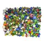 A LARGE COLLECTION OF ONION SKIN AND NAILSEA GLASS MARBLES A mixed selection of well over four