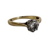 A VINTAGE 18CT GOLD AND DIAMOND SOLITAIRE RING The single round cut diamond in a plain design. (size