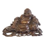 A LARGE EARLY 20TH CENTURY CHINESE CARVED WOODEN SEATED BUDDHA On a fitted pierced wooden base. (