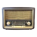 A MID 20TH CENTURY BRITISH MADE BROWN GLAZED BAKELITE RADIO TYPE VHF 71. Condition: as seen