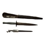 A WORLD WAR I MILITARY DAGGER/DIRK Straight blade, metal pewter handle, brown leather wrap scabbard,