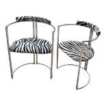 A PAIR OF VINTAGE ZEBRA PRINT UPHOLSTERED CHROME OPEN ARMCHAIRS. (55cm x 41cm x 73cm) Condition: