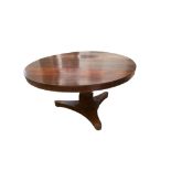 A WILLIAM IV PERIOD ROSEWOOD TILT TOP BREAKFAST TABLE With faceted column on platform base, seats