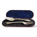 A VICTORIAN SILVER CHRISTENING SET Comprising a spoon and fork with beaded rope twist design,