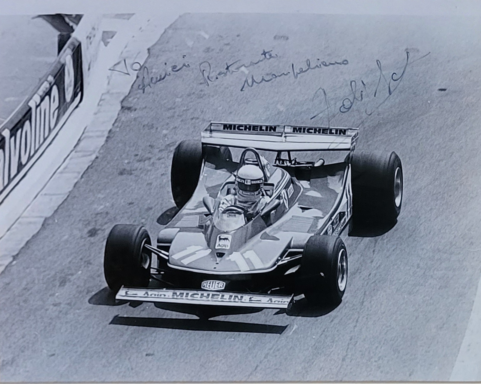 JODY SHECKTER, AN AUTOGRAPHED ‘FORMULA 1 MOTORSPORT’ PHOTOGRAPH Ferrari racing car, signed 'To