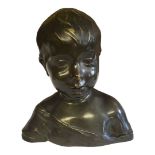 AN EARLY 20TH CENTURY CONTINENTAL PATINATED BRONZE BUST OF A YOUNG BOY, CIRCA 1930. Condition: good