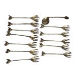 A SET OF TWELVE CONTINENTAL SILVER COCKTAIL FORKS Having a pineapple finial, marked ‘S800’, together