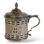 A GEORGIAN SILVER AND BLUE GLASS MUSTARD POT Having pierced and engraved neoclassical decoration