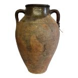 A 19TH CENTURY CONTINENTAL TERRACOTTA TWIN HANDLED VASE Amphora shape, after etruscan design, having