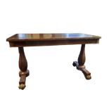 A WILLIAM IV PERIOD ROSEWOOD LIBRARY TABLE With two bulbous faceted columns standing on platforms