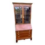 A LATE VICTORIAN MAHOGANY AND MARQUETRY INLAID BUREAU BOOKCASE The fall front with fitted interior