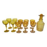 A SET OF SIX 19TH CENTURY BOHEMIAN AMBER FLASHED GLASS WINE GOBLETS Trumpet form, with overlaid