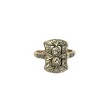 A VINTAGE 18CT GOLD AND DIAMOND PLAQUE RING Set with two central round cut diamonds edged with