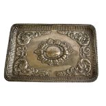 AN EARLY 20TH CENTURY SILVER DRESSING RECTANGULAR TABLE TRAY With embossed decoration, hallmarked