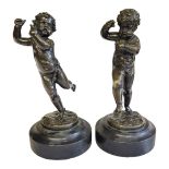 A FINE PAIR OF 19TH CENTURY FRENCH PATINATED BRONZE MODELS OF BACCHANALIAN CHERUBS Modelled after