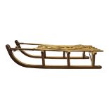 A VINTAGE BEECHWOOD SLEDGE With iron fittings. (112cm x 33cm x 30cm) Condition: good overall