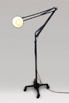 AN EARLY FLOOR-STANDING HERBERT TERRY ANGLEPOISE LAMP. Name and information embossed onto angle