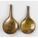 AN EXQUISITE PAIR OF ANCIENT GLASS FLASKS. Finely blown in yellow coloured glass. The vessels