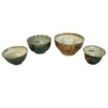 WEDGWOOD, DAISY-MAKEING JONES, A SET OF FOUR LUSTRE CABINET BOWLS OF IMPERIAL CHINESE DESIGN The