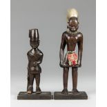 TWO EARLY 20TH CENTURY CARVED AFRICAN KAMBA FIGURES, KENYA. In the form of an Askari colonial