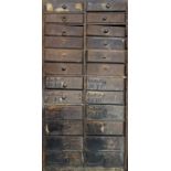 A 19TH CENTURY PINE CLOCK/WATCH REPAIRERS CHEST OF TWENTY-FOUR DRAWERS AND CONTENTS Comprising of