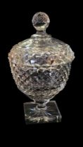 A 19TH CENTURY CUT LEAD CRYSTAL GLASS SUCRIER AND COVER Having a domed finial and hobnail cut