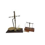 A FINE VICTORIAN AVERY LTD SET OF APOTHECARY BRASS AND COPPER SCALES, CIRCA 1870 With faceted