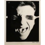 STEPHANE GRAFF, B. 1965, A SIGNED 1986 SILVER GELATIN PRINT Titled ‘Male With Fork Across Eyes’,