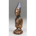 A LATE 19TH CENTURY YORUBA TWIN FIGURE (ERE IBEJI). Yoruba People, Nigeria. Carved wood with