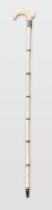 A VICTORIAN MARINE IVORY WALKING STICK WITH BALEEN SPACERS. (90cm)