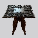 AN ANTIQUE INDONESIA CARVED SIDE TABLE, NORTH SUMATRA. (h 62cm x w 60cm x d 60cm)