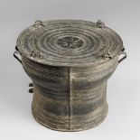 A 19TH CENTURY SOUTH EAST ASIAN BRONZE RAIN DRUM. Cast with raised linear decoration centred by a