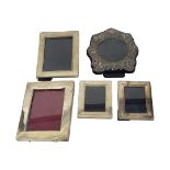 A COLLECTION OF VINTAGE SILVER PHOTOGRAPH FRAMES Plain rectangular form with wooden easel backs,