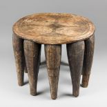 A LATE 19TH/EARLY 20TH CENTURY CARVED TRIBAL NUPE STOOL TABLE. Carved from a single piece of