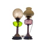 TWO VICTORIAN GILDED BRASS OIL LAMPS One with green glazed cut glass reservoirs, short column, one