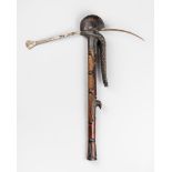 AN UNUSUAL ANTIQUE AFRICAN CARVED TRIBAL AXE. (l 51cm x w 42cm)