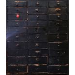 A 19TH CENTURY PINE CLOCK/WATCH REPAIRERS CHEST OF THIRTY DRAWERS AND CONTENTS Comprising of brass