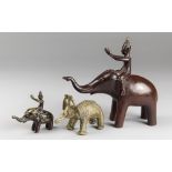 A COLLECTION OF THREE BRASS AND BRONZE ELEPHANT SCULPTURES. Comprising of a small antique Thai