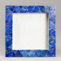 A LAPIS LAZULI PICTURE FRAME ON WHITE MARBLE (h 29cm x w 28.5cm x d 8cm)