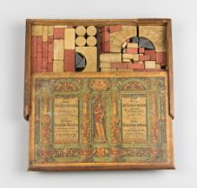 A 19TH CENTURY GERMAN SET OF STONE BUILDING BLOCKS. Two layers of blocks of mixed colour and