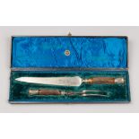 A VICTORIAN STERLING SILVER, STEEL AND ANTLER HANDLE CARVING SET WITH ORIGINAL PRESENTATION CASE.