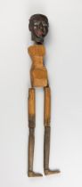 A MID 20TH CENTURY MARIONETTE PUPPET FORM. With articulated joints, characteristic boots, and dark-